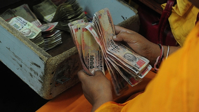 Rs 1000 and Rs 500 notes (SANJAY KANOJIA/AFP/Getty Images)