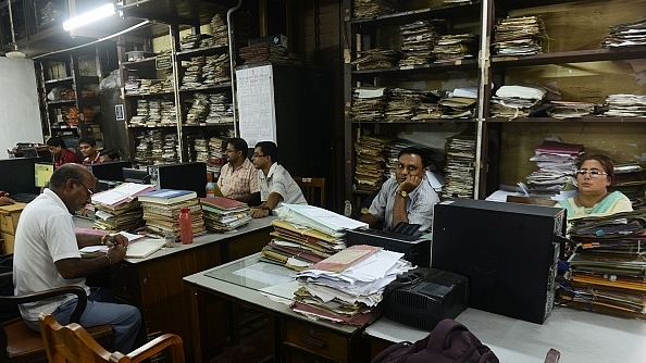 Employees at a government
office in Kolkata (DIBYANGSHU SARKAR/AFP/Getty Images)