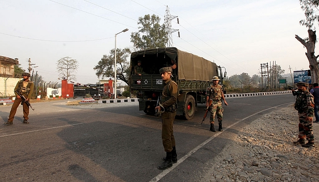 
Indian army soldiers take position at an Indian army base at Nagrota. Photo 
credit: STRINGER/AFP/GettyImages

