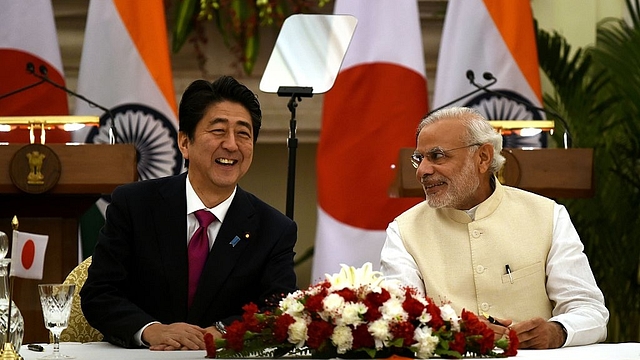 Prime Minister Narendra Modi with Japan’s Prime Minister Shinzo Abe. Photo credit: MONEY SHARMA/AFP/GettyImages