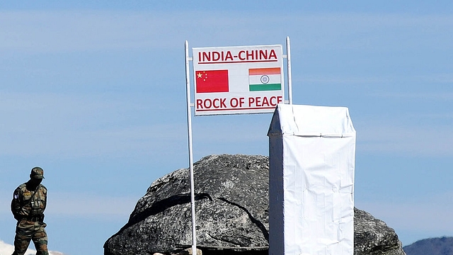 

An Indian Army soldier keeps a vigil at Bumla pass at the India-China border. (BIJU BORO/AFP/Getty Images)