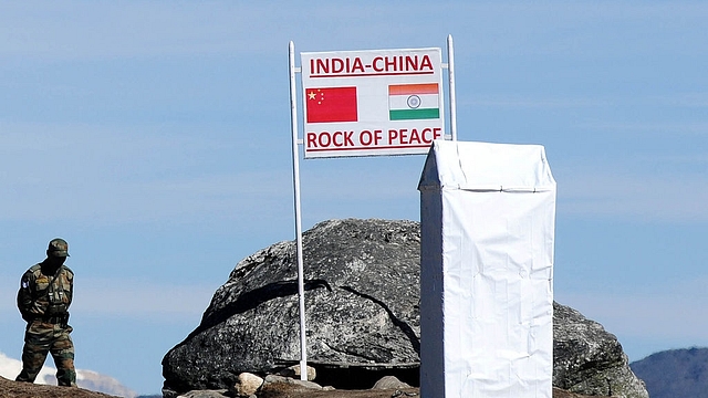 

An Indian Army soldier keeps a vigil at Bumla pass at the India-China border in Arunachal Pradesh.  Photo credit: BIJU BORO/AFP/GettyImages