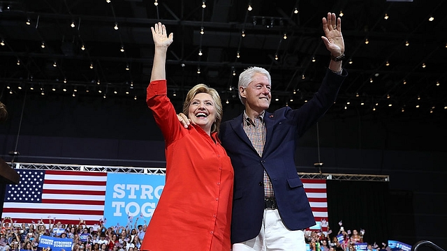 Democratic presidential nominee  Hillary Clinton and her husband, former US president Bill Clinton (Justin Sullivan/Getty Images)