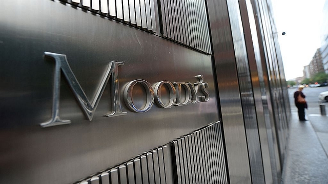 A sign for Moody’s rating agency stands in front of the company headquarters in New York. (EMMANUEL DUNAND/AFP/Getty Images)