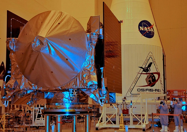 

A spacecraft with satellites at Kennedy Space Center, Florida. Photo credit: BRUCE WEAVER/AFP/GettyImages