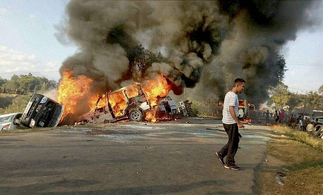 Angry 
people set on fire vehicles in protest against the United Naga Council 
(UNC)‘s indefinite economic blockade. (PTI)