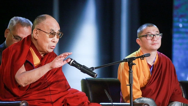 The Dalai Lama speaks at a Buddhism and Science conference in Ulan Bator, the capital of Mongolia. (BYAMBASUREN BYAMBA-OCHIR/AFP/Getty Images)