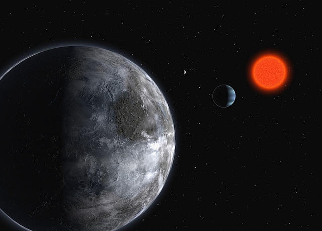  An artist’s impression of the planetary system around the red dwarf, Gliese 581. Photo credit: ESO via Getty Images