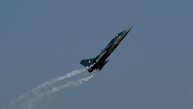 An Indian Air Force ‘Tejas’ fighter jet performs during the Air Force Day parade at Air Force Station Hindon in Ghaziabad. (MONEY SHARMA/AFP/Getty Images)