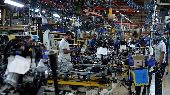 Factory workers at the
assembly lines of components for Datsun Go and Renault Kwid vehicles at Renault
Nissan Automotive India factory in Chennai.&nbsp;