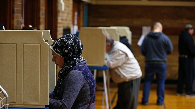 People voting in the US presidential election in Dearborn, Michigan. Photo credit: JEFF KOWALSKY/AFP/Getty Images