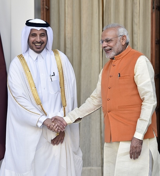 Prime Minister Narendra Modi  Qatar’s Prime Minister Abdullah bin Nasser bin Khalifa Al Thani prior to a meeting in New Delhi 3 December 2016. Photo credit: /AFP/GettyImages