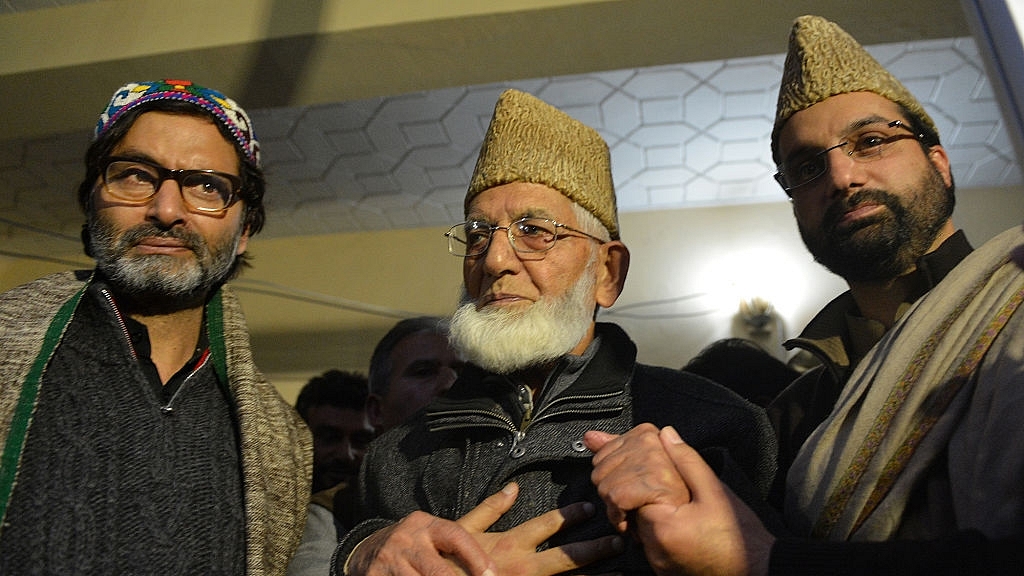 Kashmiri separatist leaders Malik (left), Geelani (centre), Umar Farooq during a press conference in Srinagar (TAUSEEF MUSTAFA/AFP/Getty Images)