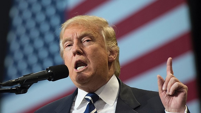 President-elect Donald Trump speaks at the USA Thank You Tour 2016 at the Wisconsin State Fair Exposition Center. (DON EMMERT/AFP/Getty Images)