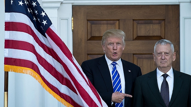 Trump welcomes retired United States Marine Corps general James Mattis as they pose for a photo before their meeting at Trump International Golf Club, November 19, 2016 in Bedminster Township, New Jersey. (Photo by Drew Angerer/Getty Images)