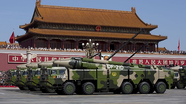 Chinese military vehicles carrying DF-21 anti-ship ballistic
missiles during a military parade in Beijing. (Andy Wong/Pool/GettyImages) &nbsp; &nbsp; &nbsp;