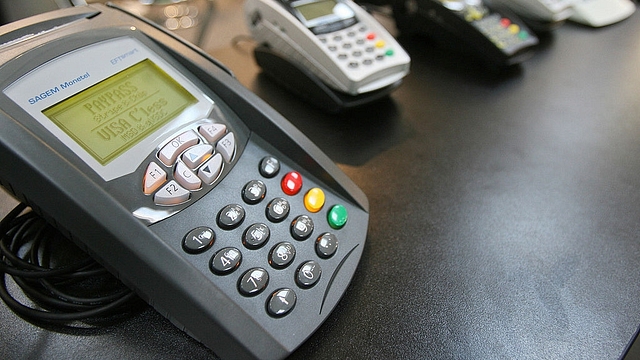 Card payment terminals are on display digital IT and telecommunications fair. (JOHN MACDOUGALL/AFP/GettyImages)