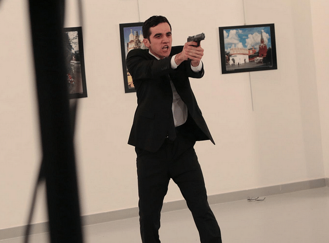 
Moments after a gunman shot dead the Russian ambassador to Turkey. (Reuters) 

