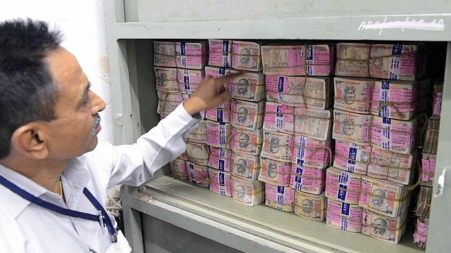 Old denomination Rs 1,000 currency notes in a bank vault in Ahmedabad (SAM PANTHAKY/AFP/Getty Images)