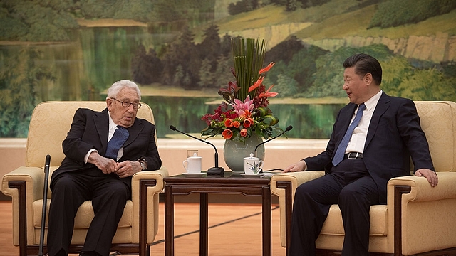 Henry Kissinger meets  Xi Jinping at the Great Halll of the People on December 2, 2016 In Beijing, China. (Photo credit: Nicolas Asouri - Pool / Getty Images)