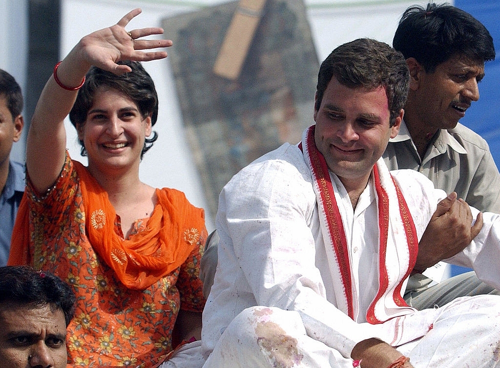 

Rahul Gandhi and his sister Priyanka Gandhi Vadra greet supporters in Sultanpur. (PRAKASH SINGH/AFP/GettyImages)