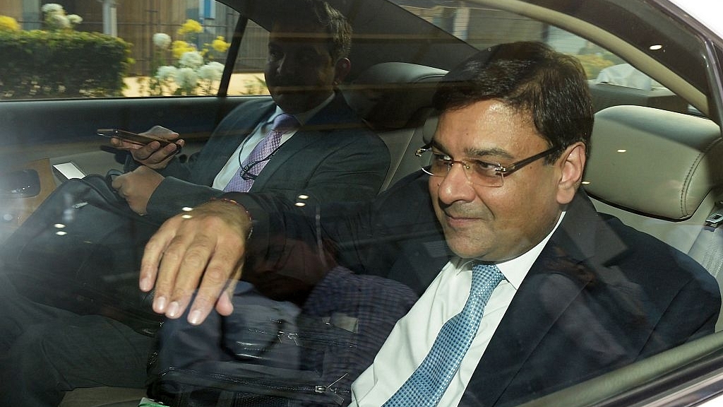 

RBI Governor Urjit Patel gestures as he sits in a vehicle after a meeting with West Bengal Chief Minister Mamata Banerjee in Kolkata. (DIBYANGSHU SARKAR/AFP/GettyImages)