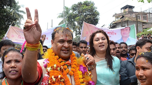 Sarma, accompanied by supporters, is on his way to file nomination papers from Jalukbari Assembly Constituency in Guwahati. (BIJU BORO/AFP/GettyImages)