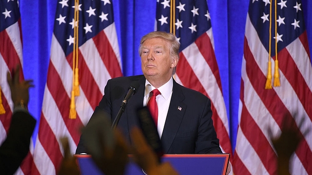 US President-elect Donald Trump answers journalists’ questions during a press conference  in New York. (DON EMMERT/AFP/Getty Images)