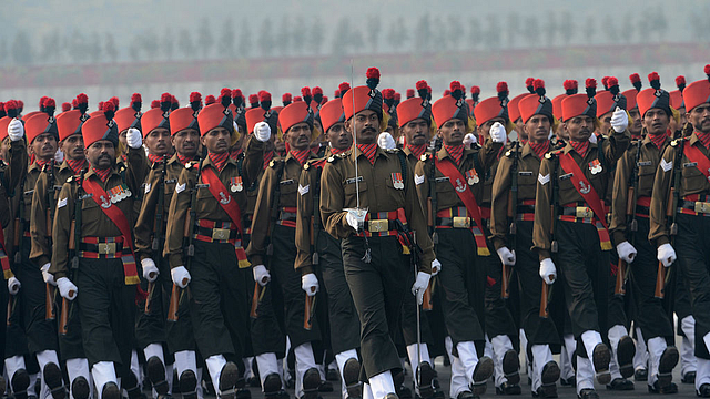 <b>Indian Army soldiers march during the
Army Day parade in New Delhi. (RAVEENDRAN/AFP/GettyImages)</b>





