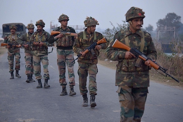 Army
personnel patrol near the Air Force Base in Pathankot. (NARINDER NANU/AFP/GettyImages)