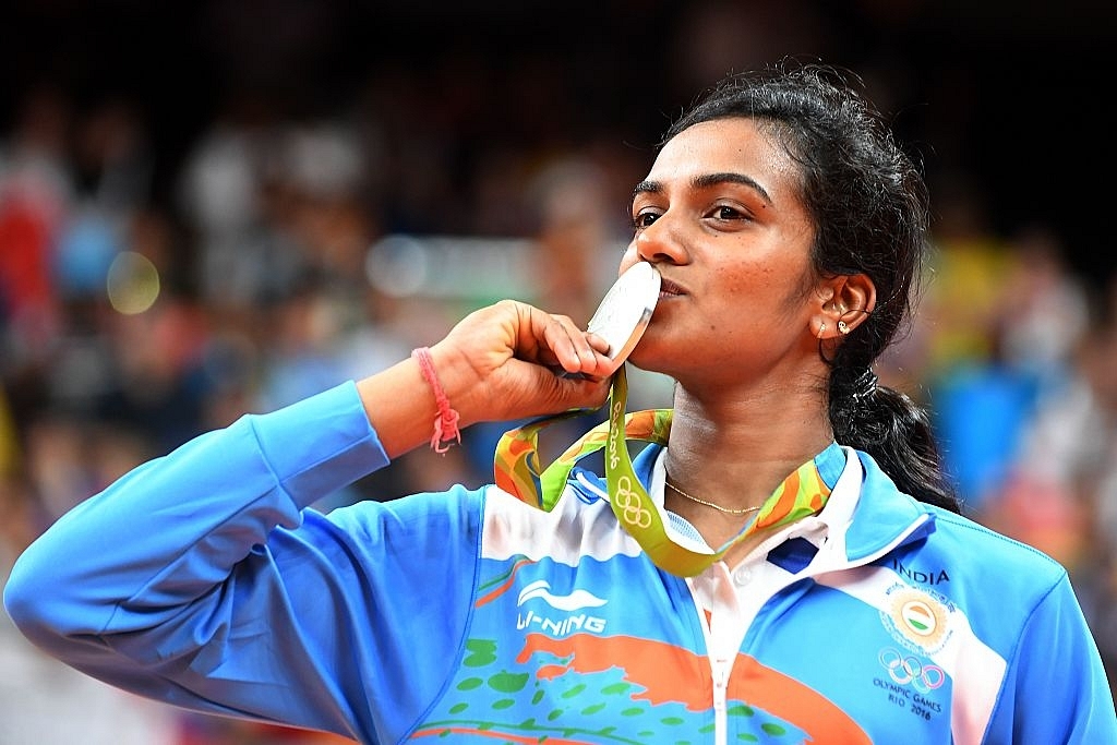 Silver medalist India’s Pusarla V Sindhu celebrates following the women’s singles Gold Medal badminton match in Rio de Janeiro, 2016 (GOH CHAI HIN/AFP/Getty Images)