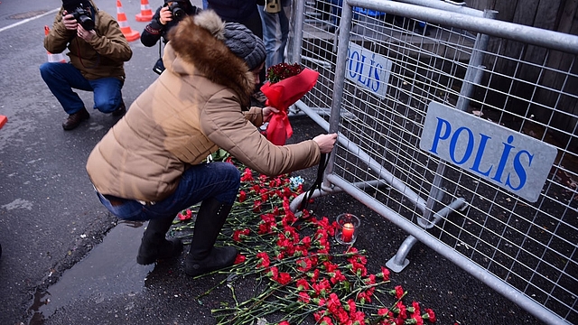 People lay flowers in front of the Reina nightclub in
Istanbul, after a gunman killed 39 people, including many foreigners, in a
rampage at an upmarket nightclub in Istanbul. (YASIN AKGUL/AFP/GettyImages) &nbsp; &nbsp; &nbsp;