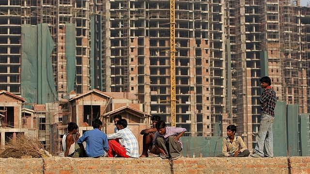  Workers rest at an under-construction site in Gurgaon, some 30 km south of New Delhi. (MANAN VATSYAYANA/AFP/Getty Images)