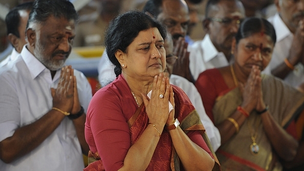 Sasikala and Panneerselvam paying their respects at the memorial for Jayalalithaa after Sasikala was elected party general secretary. (ARUN SANKAR/AFP/Getty Images)