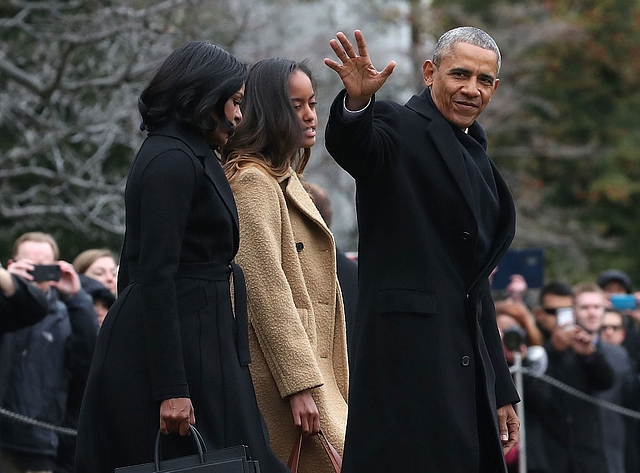 
U.S. President Barack Obama waves while departing from the White House. (Mark Wilson/Getty Images)

