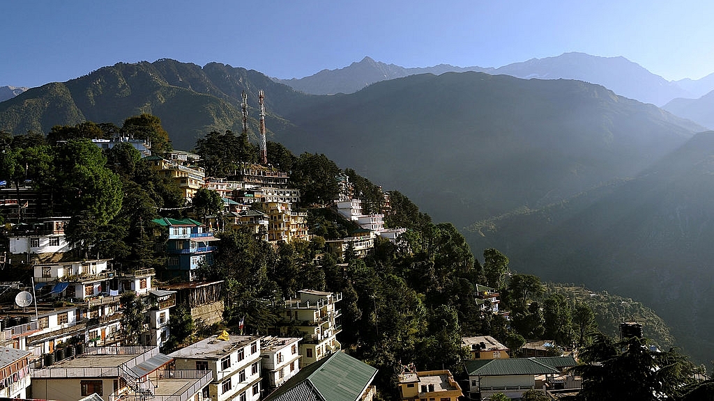 A view of the Dharamshala town is seen amidst the Dhauladhar range of mountains from the Namgyal Monastry. (Manjunath Kiran/AFP/Getty Images)