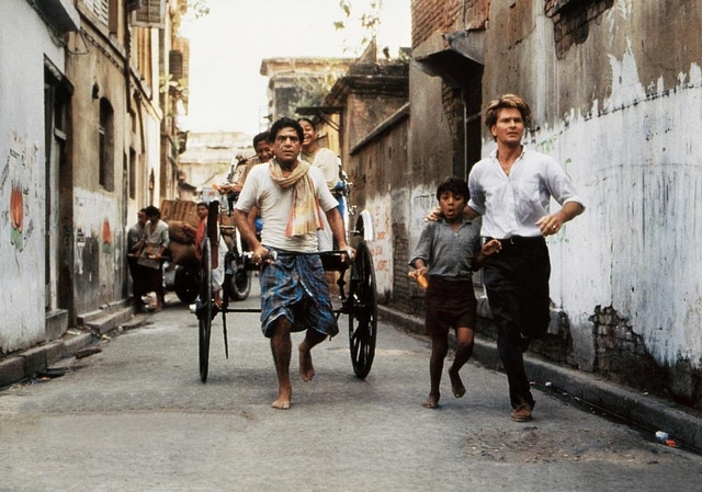 CITY OF JOY, from centre: Om Puri, Imran Badsah Khan, Patrick Swayze, 1992 (©Tri-Star Pictures)