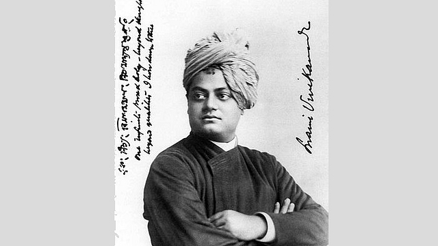 Swami Vivekananda, September 1893, Chicago. On the left, Vivekananda wrote, “one infinite pure and holy – beyond thought beyond qualities I bow down to thee.”