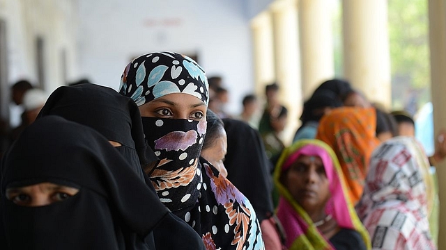 Muslim women voting in the Lok Sabha elections 2014, (Sanjay Kanojia/AFP/Getty Images)&nbsp;