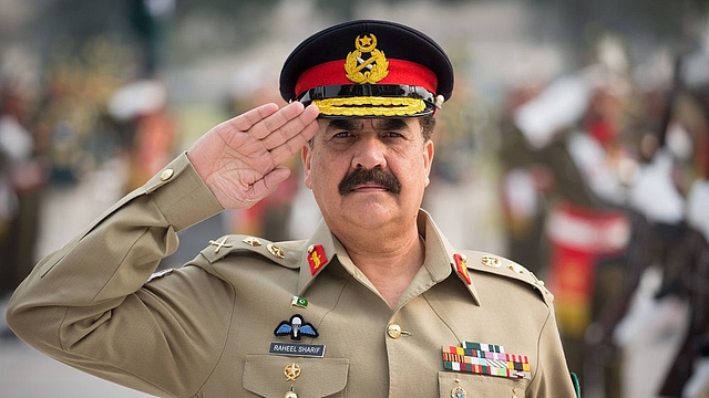 General Raheel Sharif salutes as he inspects a military guard
of honour in Islamabad.(KAY NIETFELD/AFP/GettyImages)