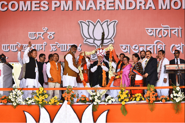 

Prime Minister Narendra Modi is welcomed by party workers ahead of his election speech in Imphal. (Prime Minister’s Twitter Page)