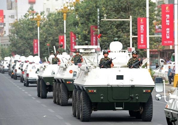 

Chinese security forces participating in a military drill in Hetian, northwest China’s Xinjiang region. (AFP/AFP/Getty Images)