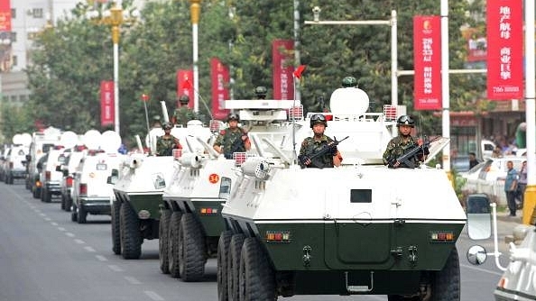 Chinese security forces participating in a military drill in Hetian, northwest China’s Xinjiang region (Representative Image) (AFP/AFP/Getty Images)