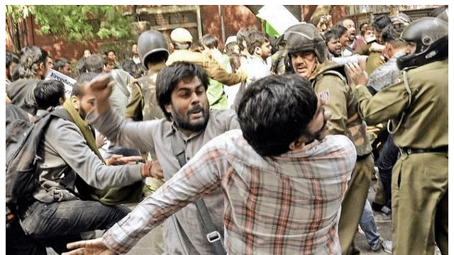 SFI’s Delhi president Prashant Mukherjee thrashing a student of Delhi University. (The Hindu)