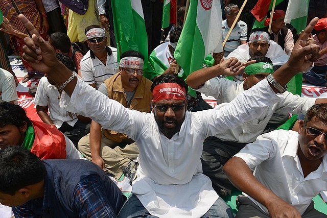 
Nepalese activists chant slogans during a demonstration 
against the government. (PRAKASH MATHEMA/AFP/Getty Images)

