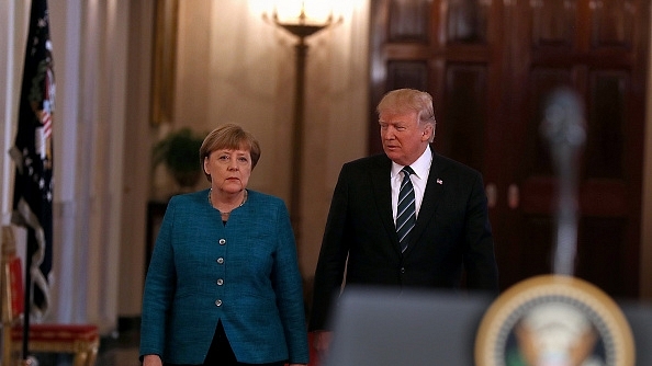 US President Donald Trump with German Chancellor Angela Merkel (Justin Sullivan/Getty Images)