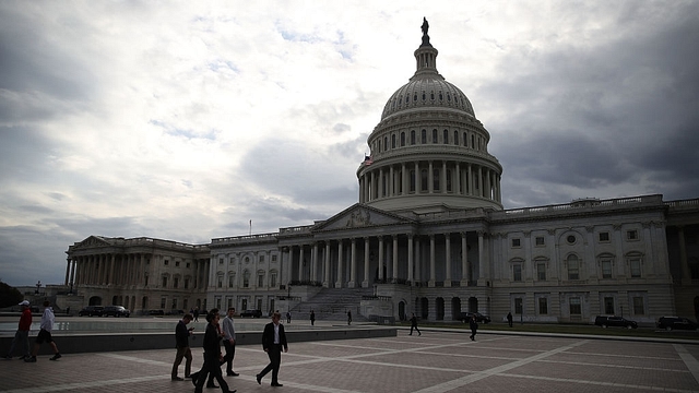 Clouds pass over the US Capitol in Washington, DC. (Mark Wilson/Getty Images)