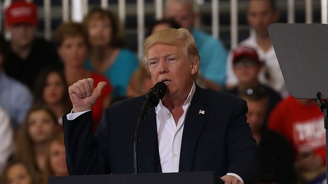 US President Donald Trump speaks during a rally at  Orlando Melbourne International Airport in Melbourne, Florida. (Joe Raedle/Getty Images)