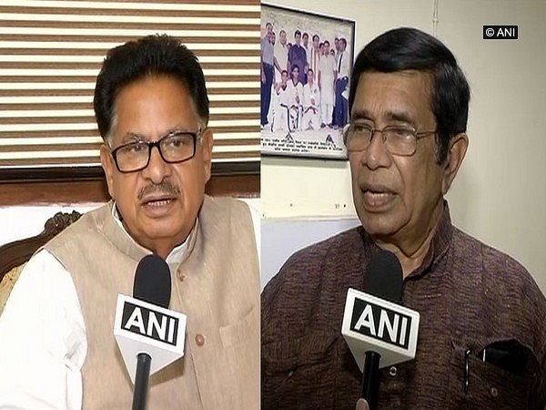 
Congress leaders Oscar Fernandes


and P L Punia. 

