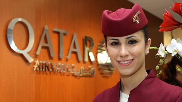 An air hostess of Qatar Airways at the International Tourism Fair. (Andreas Rentz/GettyImages) &nbsp;